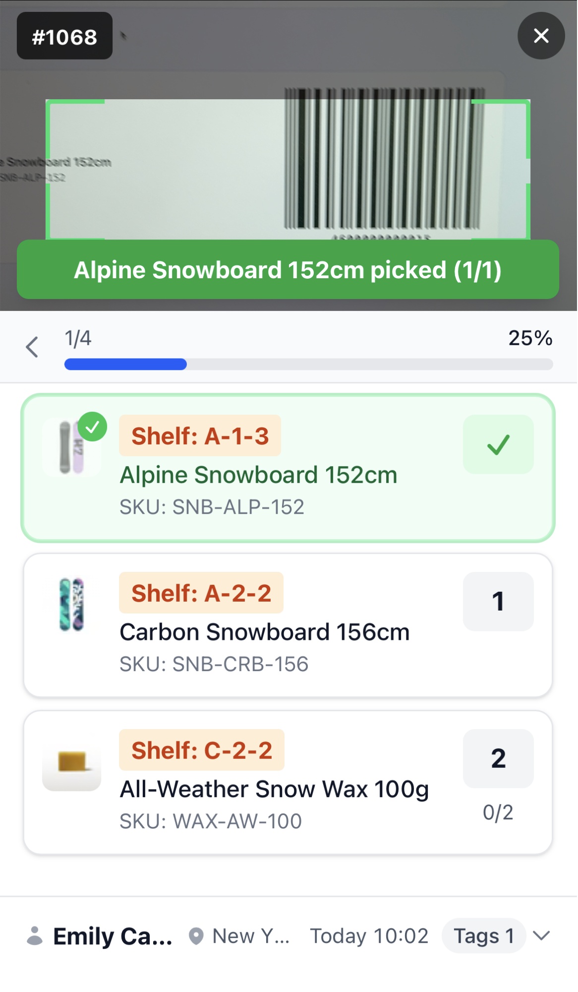 Worker scan screen: the camera frame with a barcode inside it, a green banner reading "Alpine Snowboard 152cm picked (1/1)", a progress bar showing 1/4 and 25%, then the item list with the picked row marked by a green check and the remaining rows showing shelf, product name, SKU and quantity, and the recipient name, area, time and tag count along the bottom